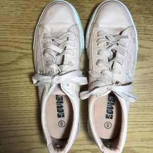 Baby pink sneakers.